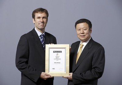 Chairman Wang Xiaochu (Right) received "Overall Best Managed Company in Asia" award from FinanceAsia