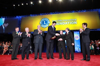 HAMBURG, Germany, 8 July 2013 – Lions Clubs International Foundation pledged $7.8 million to Special Olympics, expanding worldwide efforts to support the inclusion and well-being of people with intellectual disabilities. Members of Lions Clubs International (LCI) and Special Olympics were present to celebrate the expanded partnership. Pictured from left to right: Joe Preston, 2nd International Vice President, LCI; Barry Palmer, 1st International Vice President, LCI; Wayne Madden International President; Yao Ming, Special Olympics Board Director; Ben Haack, Special Olympics Australia athlete; Dr. Tam Wing-kun, Chairperson, Lions Clubs International Foundation and Timothy P. Shriver, Special Olympics Chairman and CEO. Photo by Darren Miller Photography